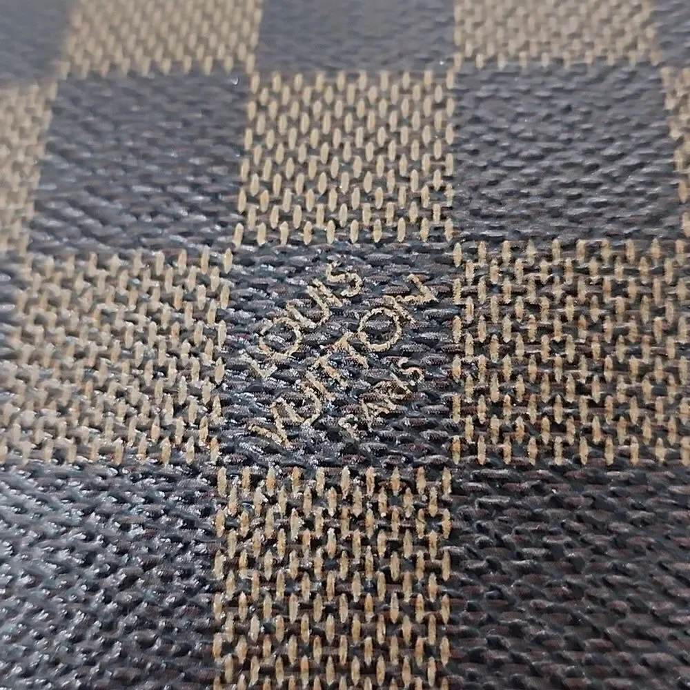 Authentic Louis Vuitton Damier Ebene Mini Pochette